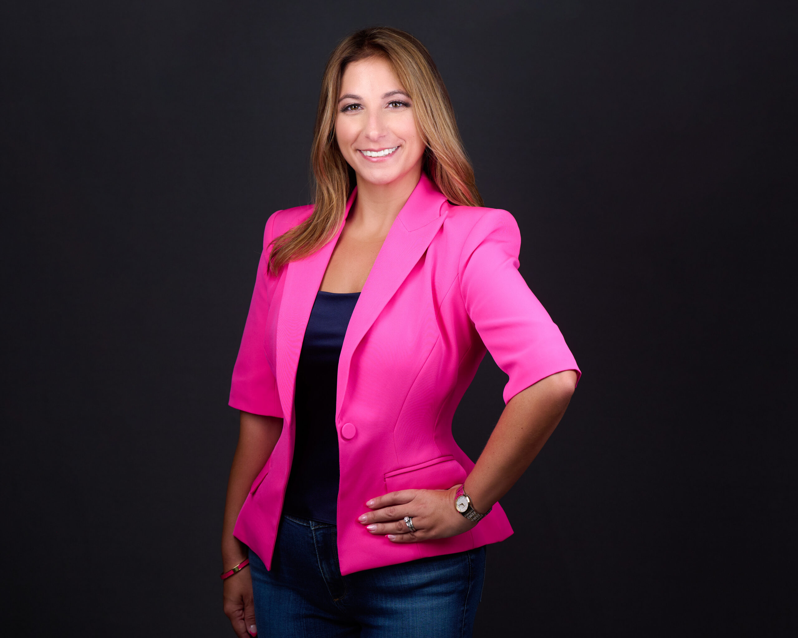 Attorney portrait in pink blazer